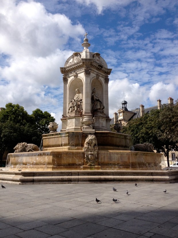 The fountains in the square at the entrance to St. Sulpice. We arrived so early for the first mass that they weren't running yet and it was fun to see them when we returned.
