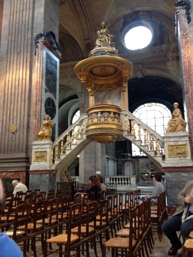 This gilded immensity is the lectern in the center of the nave, from which the gospel would be read, signifying its imminence and its majesty. God with us.