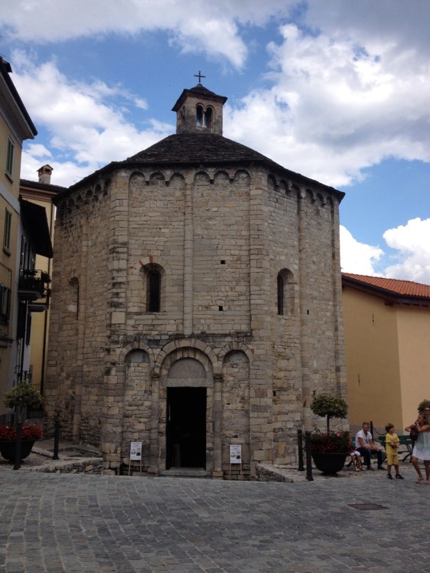We were drawn to Lenno in part because of its claim to this 11th-century octagonal baptistry, just across the square (and, incidentally, next door to where we ate dinner) from the parish church. We were disappointed with it, though. It's been repurposed to a generic community space and while we were there was home to an art vendor.